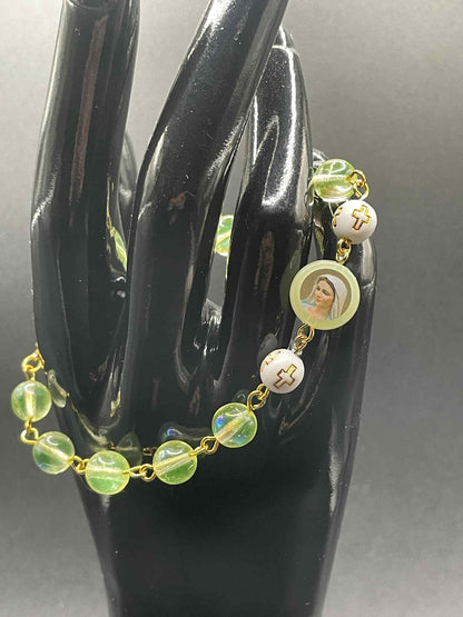 Uranium Glass Religious Bracelet | Yellow Vaseline Glass with Jesus & Virgin Mary Saints | White Beads with Gold Cross | Glows Green Under UV Light | Spiritual Jewelry