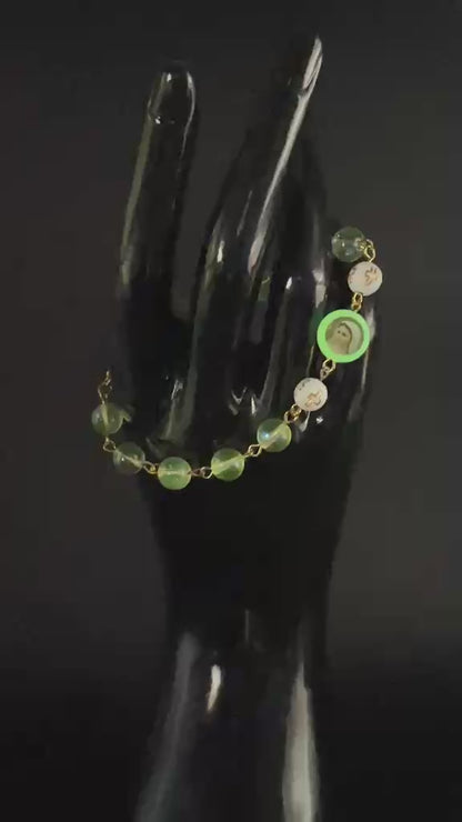 Uranium Glass Religious Bracelet | Yellow Vaseline Glass with Jesus & Virgin Mary Saints | White Beads with Gold Cross | Glows Green Under UV Light | Spiritual Jewelry